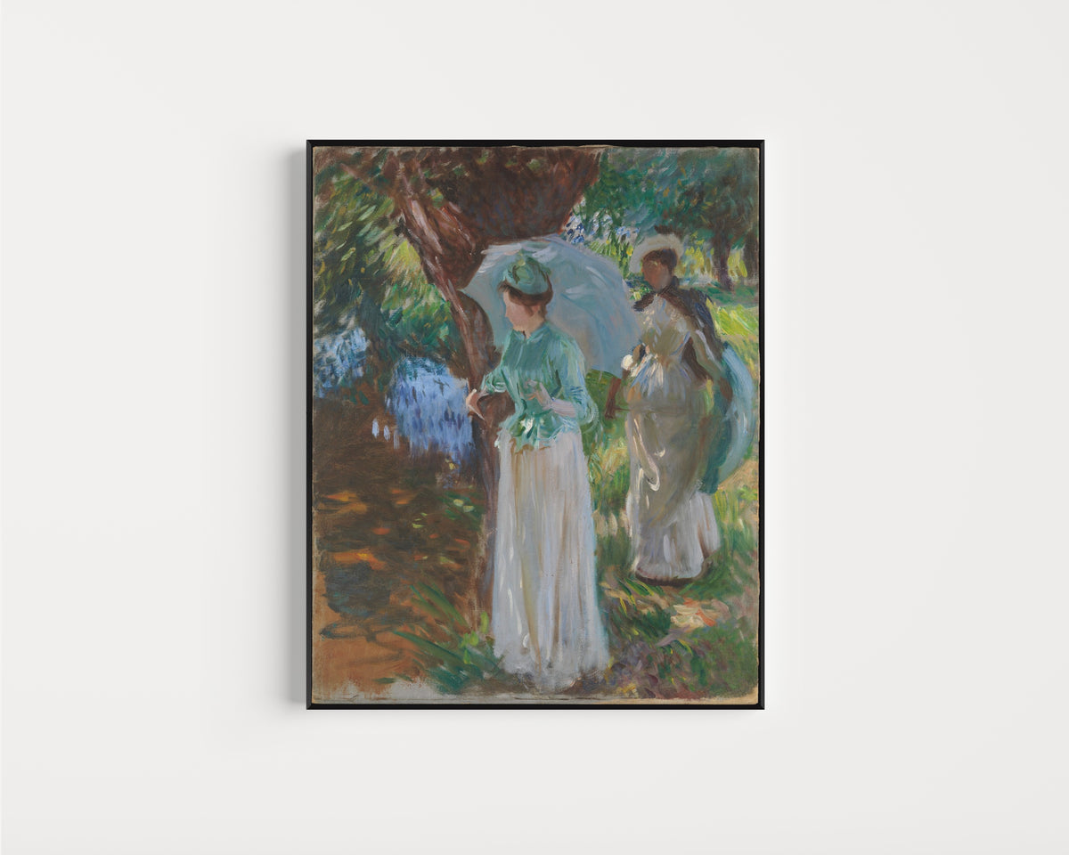 Framed art print of Two Girls with Parasols by John Singer Sargent, in a slim black frame on a plain white wall