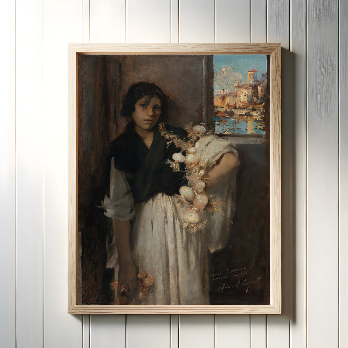 Framed art print of Venetian Onion Seller by John Singer Sargent, in a light wood frame on a white panelled wall