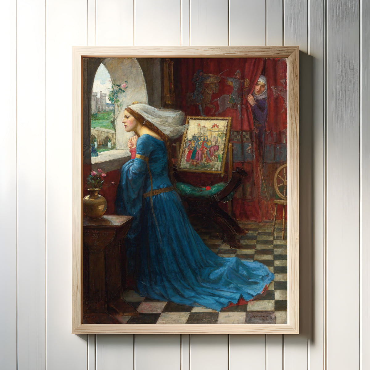Framed art print of Fair Rosamund by John William Waterhouse, in a light wood frame on a white panelled wall