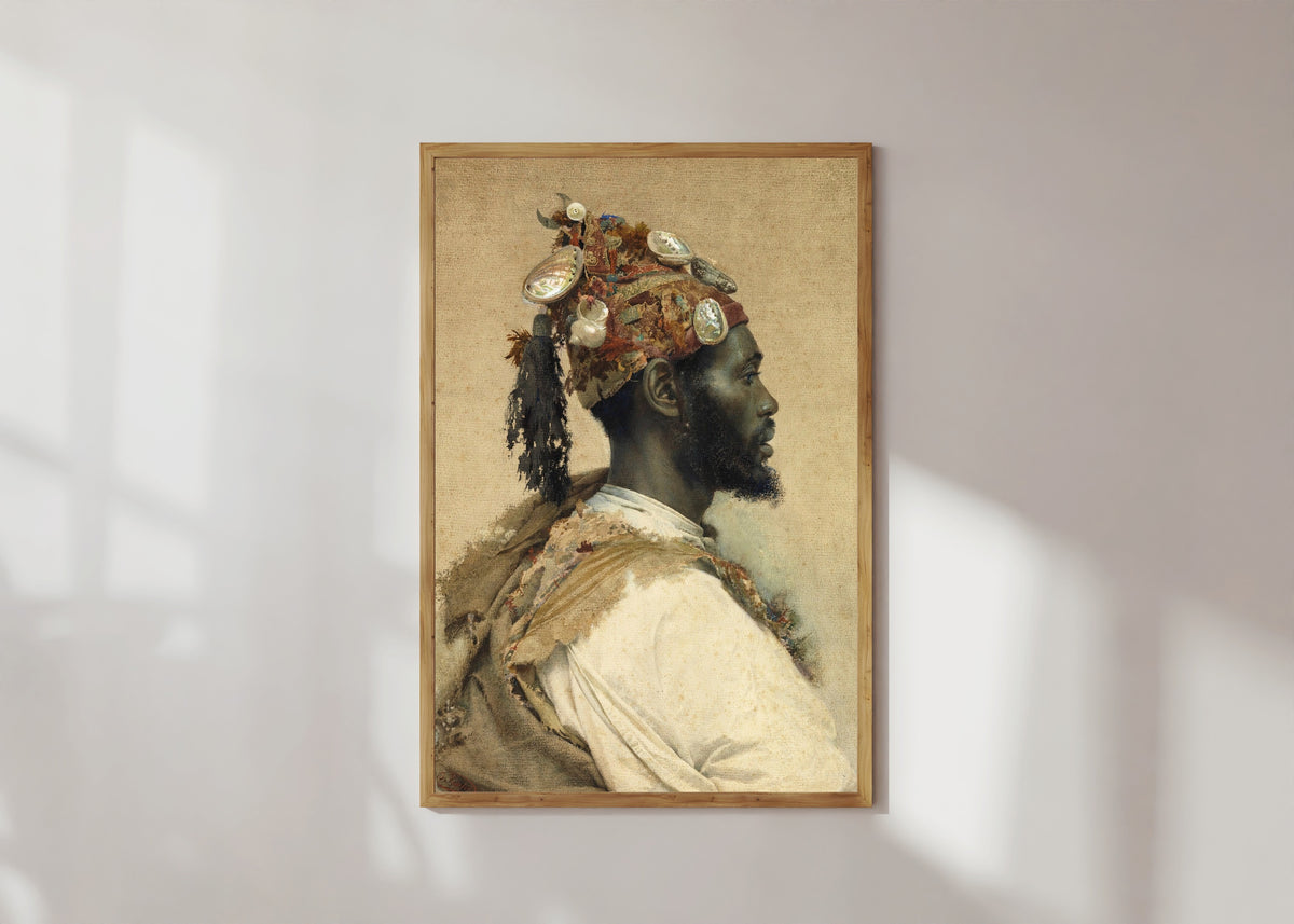Framed art print of Moorish Man 2 by Josep Tapiró Baró, in a light wood frame on a sunlit white wall