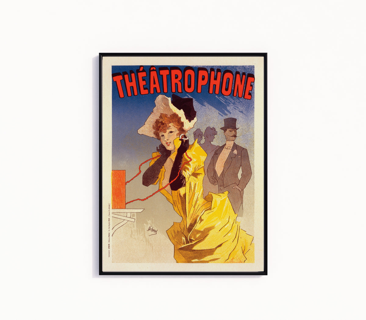 Framed art print of Théâtrophone by Jules Chéret, in a slim black frame on a plain white wall