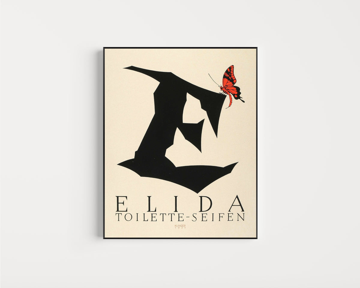 Framed art print of Elida Toilette-Seifen by Julius Klinger, in a slim black frame on a plain white wall