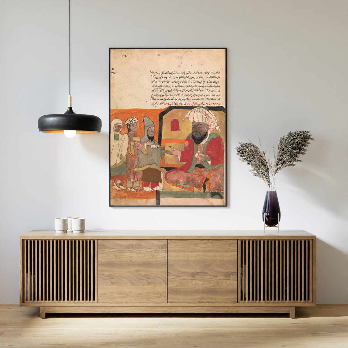 Framed art print of Kalila wa Dimna: Folio (Orange Ground), above a slatted wood sideboard