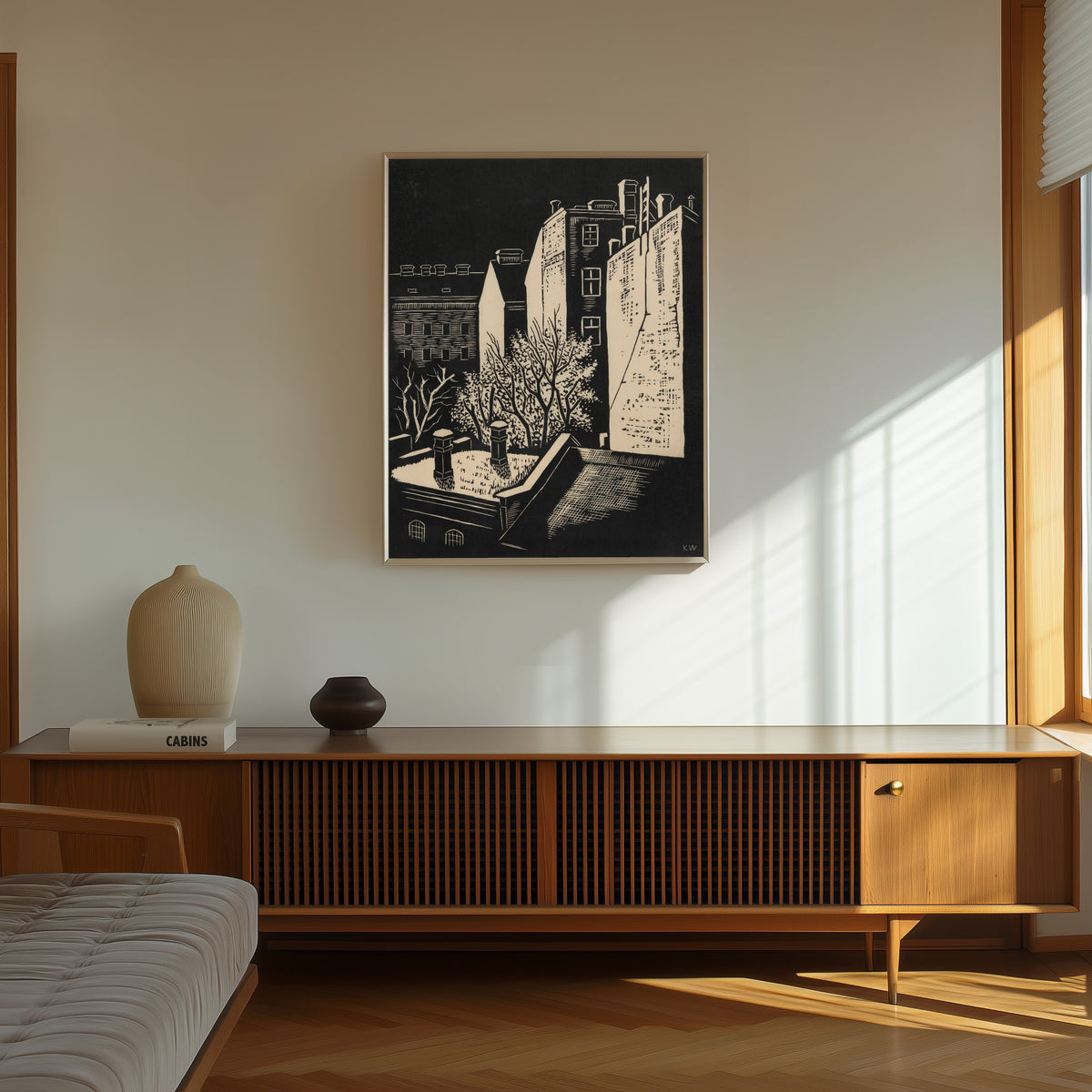 Framed art print of Vorstadtfrühling (Suburban Spring) by Karl Wiener, in a thin light frame on a sunlit wall above a wooden sideboard