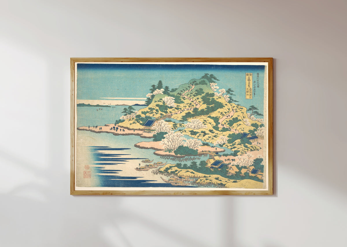 Framed art print of Remarkable Views of Bridges in Various Provinces: Tenpōzan at the… by Katsushika Hokusai, in a light wood frame on a sunlit white wall