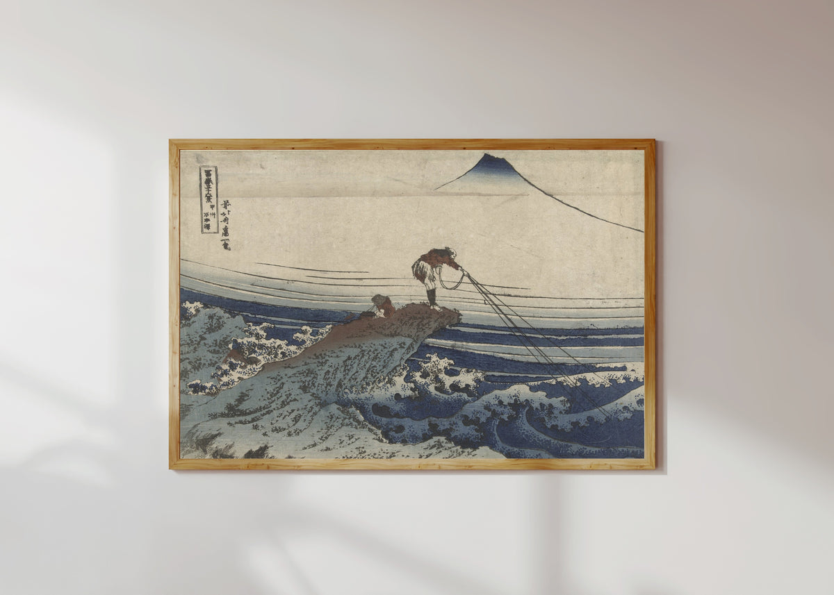 Framed art print of Thirty-six Views of Mount Fuji: Kajikazawa in Kai Province by Katsushika Hokusai, in a light wood frame on a sunlit white wall