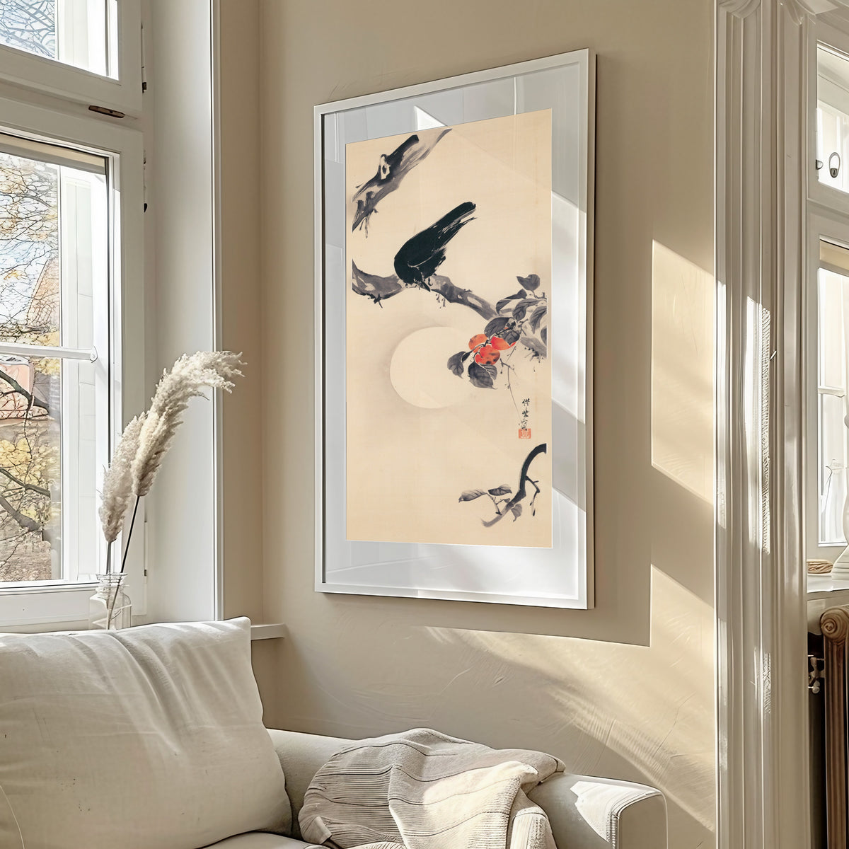 Crow on a Persimmon Branch by Kawanabe Kyosai — shown framed on a wall