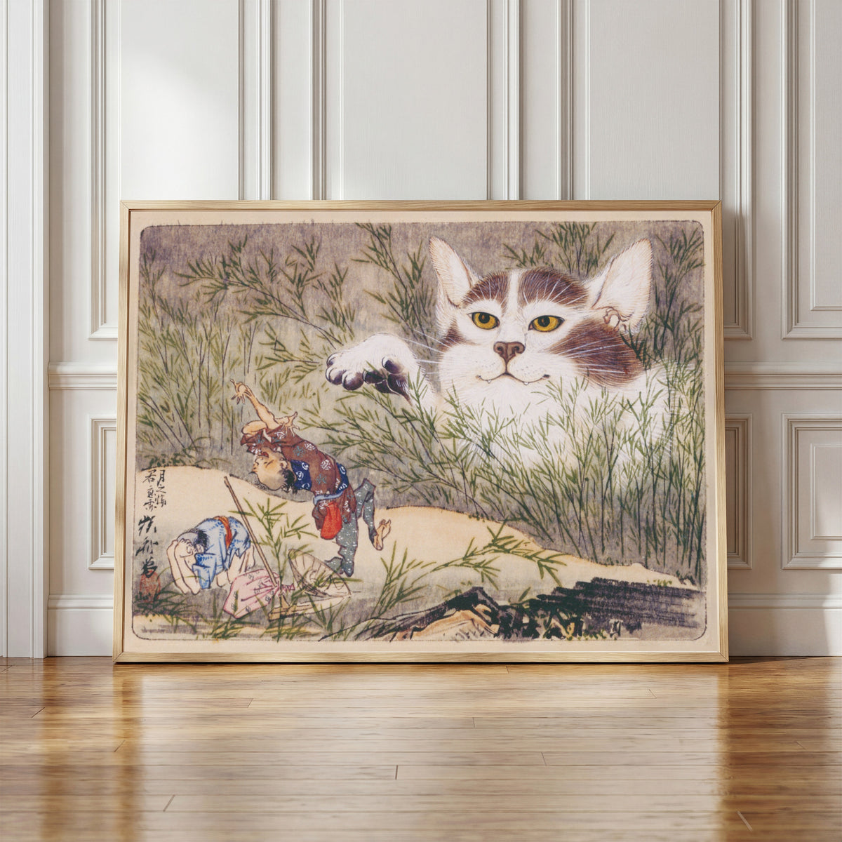 Framed art print of Seisei Kyōsai Album (Giant Cat in the Grass) by Kawanabe Kyosai, in a light wood frame leaning against a panelled white wall