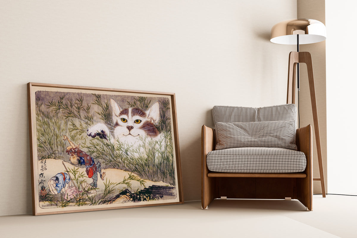 Seisei Kyōsai Album (Giant Cat in the Grass) by Kawanabe Kyosai — framed and leaning against a wall beside an armchair and a floor lamp