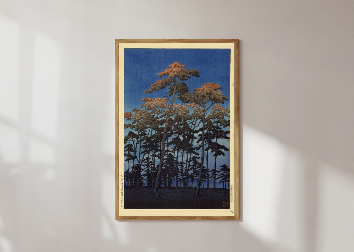 Framed art print of Hikawa Park, Omiya by Kawase Hasui, in a light wood frame on a sunlit white wall