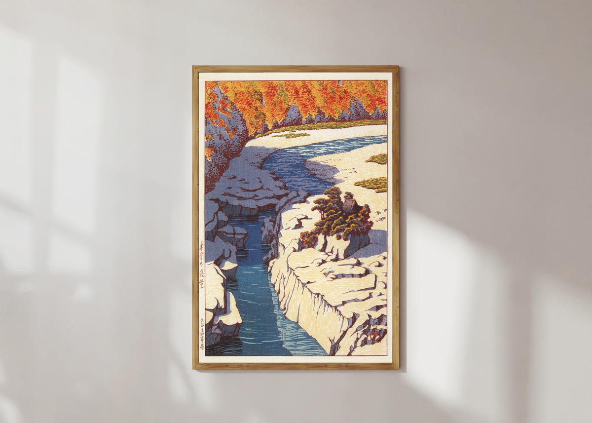 Framed art print of Kizo no Nezame by Kawase Hasui, in a light wood frame on a sunlit white wall