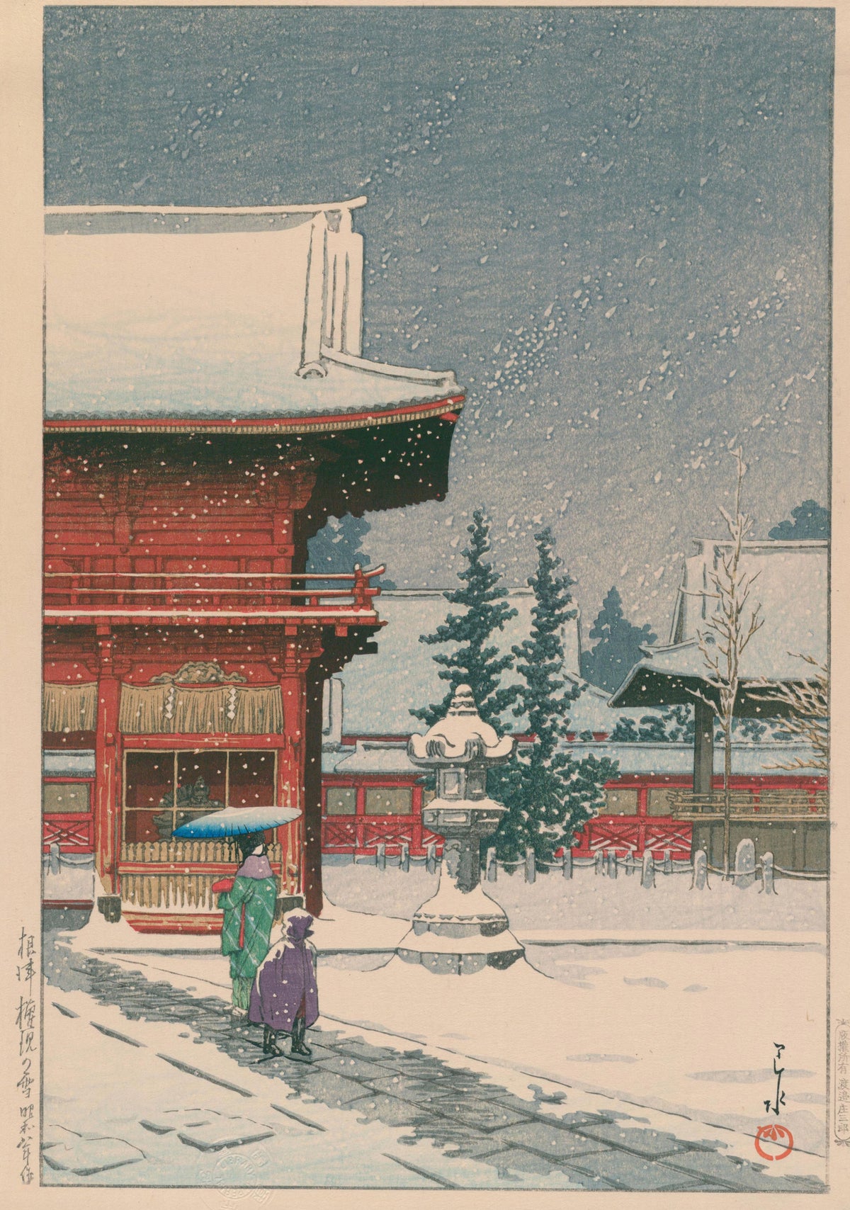Snow at Nezu Gongen Shrine by Kawase Hasui — Snow falling on a red shrine hall and two figures on the path