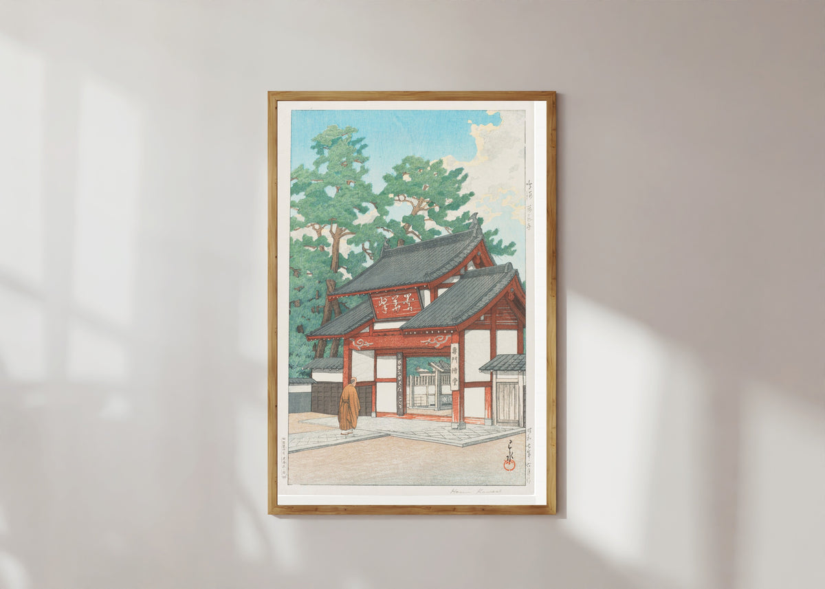 Framed art print of Zuisen Temple, Narumi by Kawase Hasui, in a light wood frame on a sunlit white wall