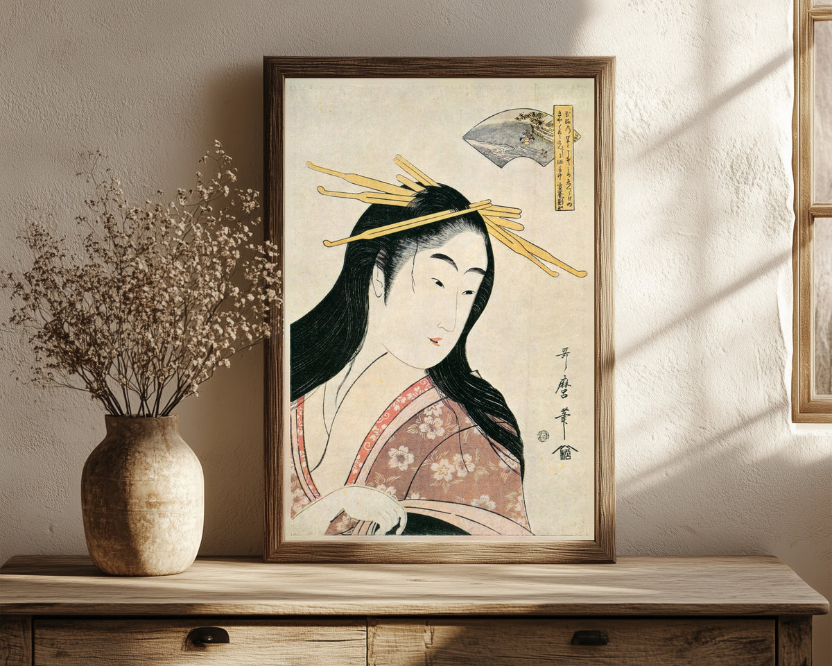 Framed art print of Chofu Jewel River, from Six Jewel Rivers by Kitagawa Utamaro, in a dark wood frame leaning on a rustic console beside dried flowers
