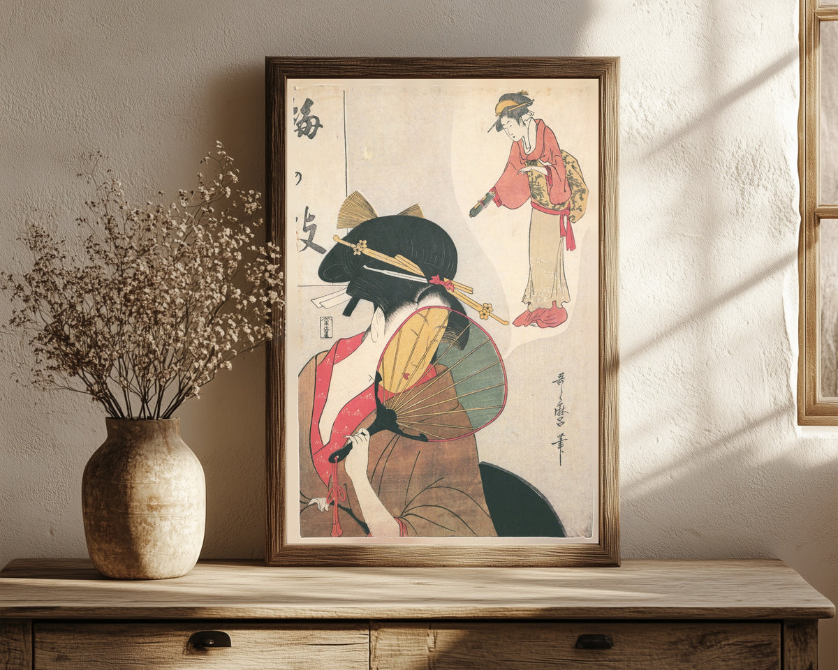 Framed art print of Dreaming Beauty (Umegae) by Kitagawa Utamaro, in a dark wood frame leaning on a rustic console beside dried flowers