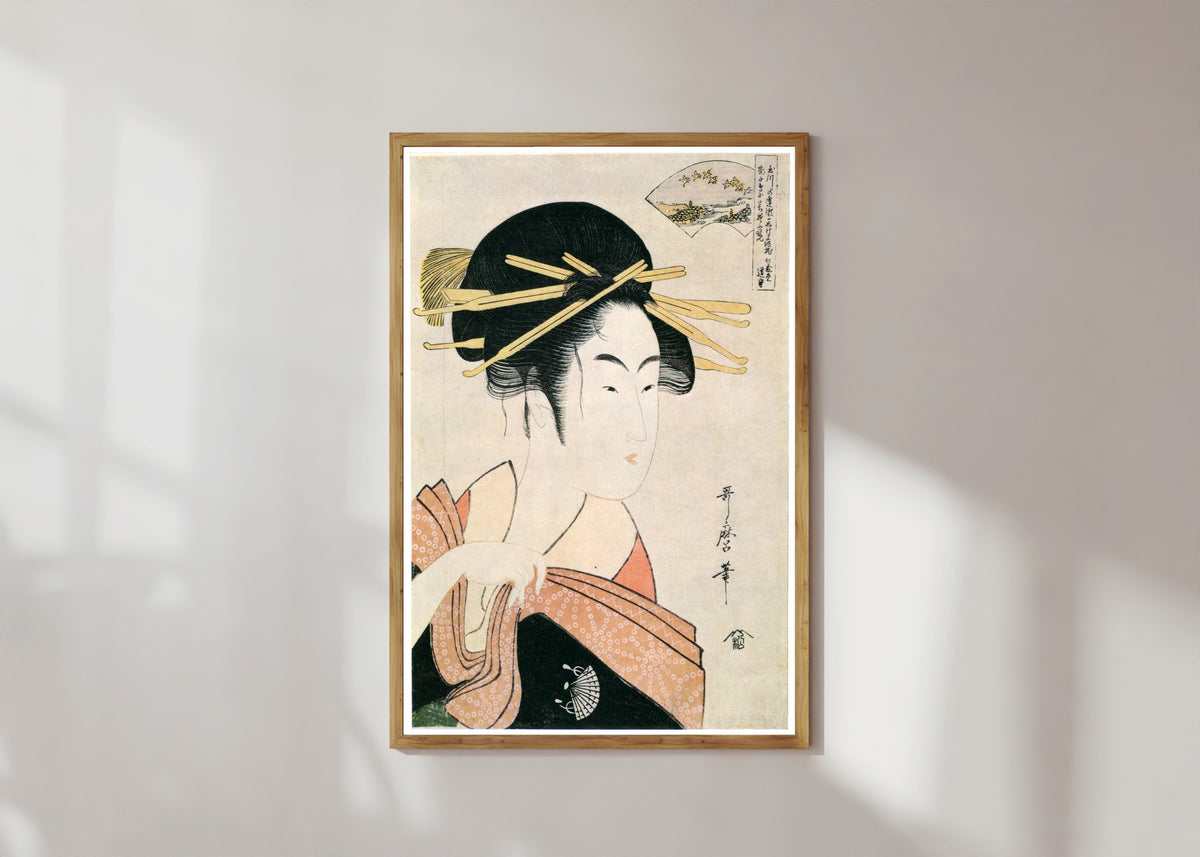 Framed art print of Noda Jewel River by Kitagawa Utamaro, in a light wood frame on a sunlit white wall