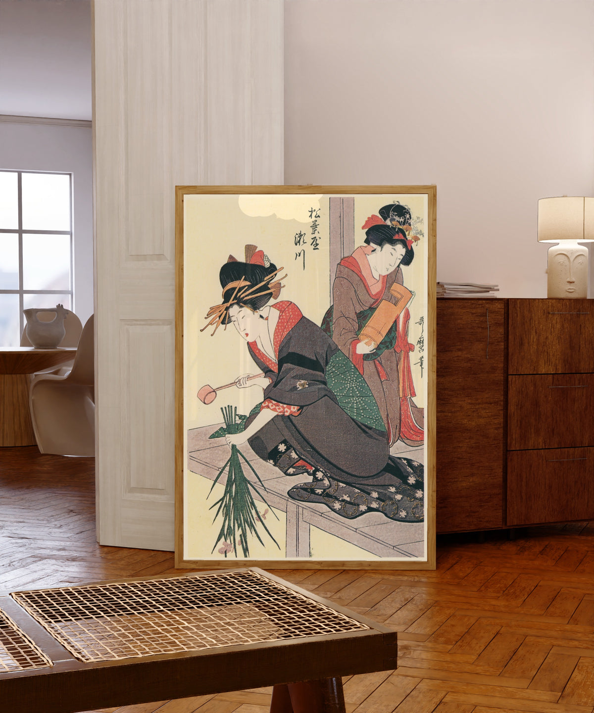Framed art print of Segawa of Matsubaya by Kitagawa Utamaro, in a light wood frame leaning in a warm room with a parquet floor