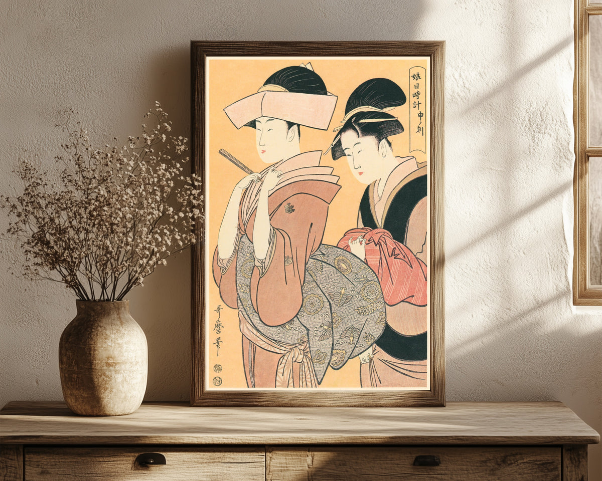 Framed art print of Woman Around the Clock at the Hour of the… by Kitagawa Utamaro, in a dark wood frame leaning on a rustic console beside dried flowers