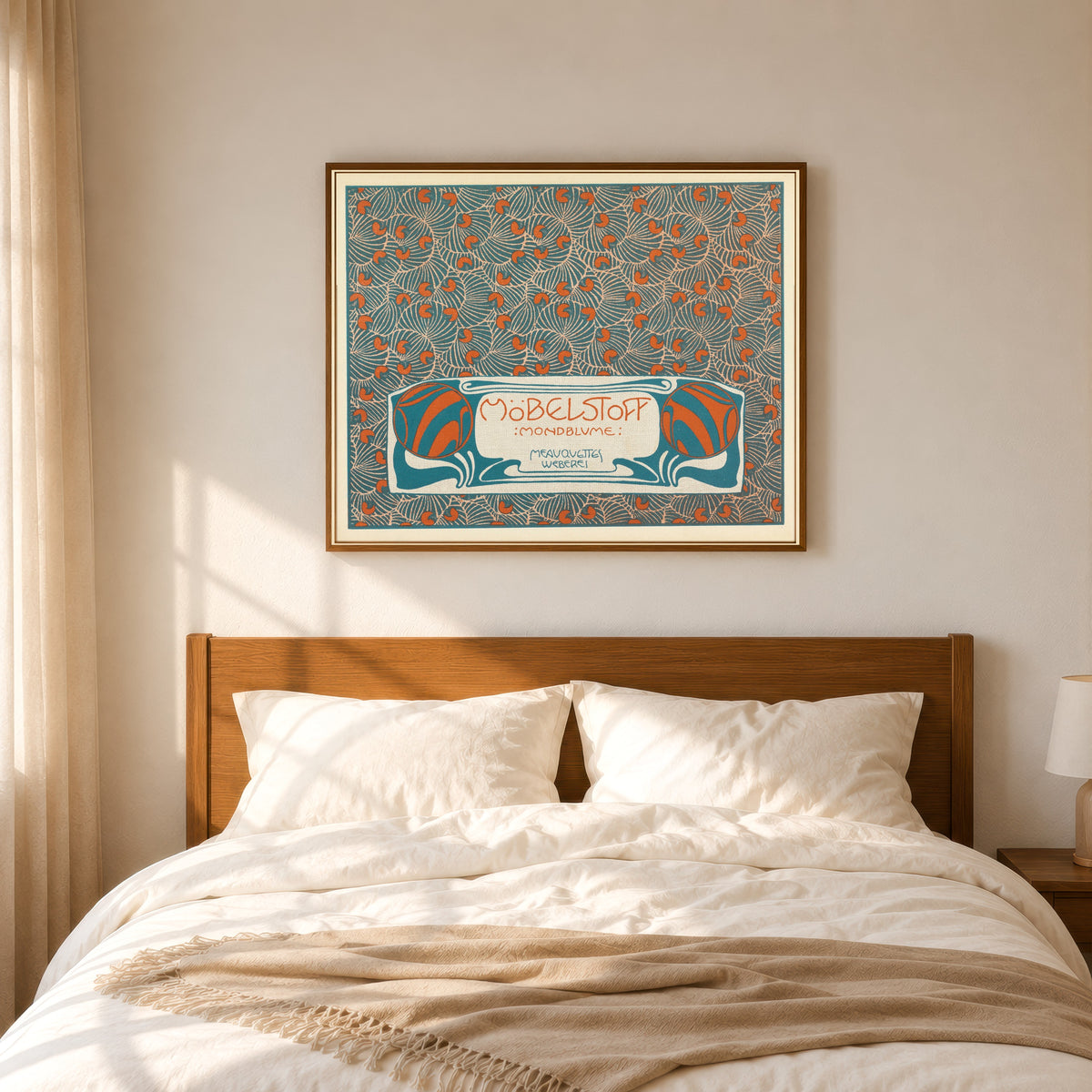 Framed art print of Möbelstoff Mondblume (Moon Blossom Woven Upholstery Fabric) by Koloman Moser, in a slim wood frame above a bed in a sunlit bedroom