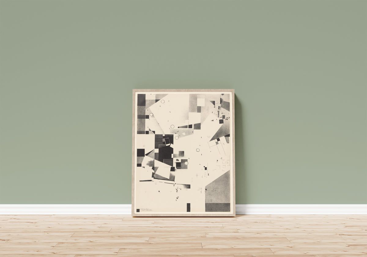 Framed art print of Merz 3. Kurt Schwitters 6 Lithos Pl.2 by Kurt Schwitters, in a light wood frame leaning on a sage green wall above a wooden floor