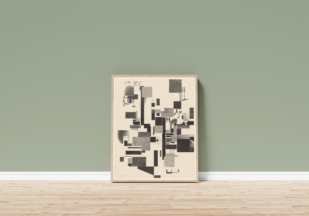 Framed art print of Merz 3. Kurt Schwitters 6 Lithos Pl.3 by Kurt Schwitters, in a light wood frame leaning on a sage green wall above a wooden floor