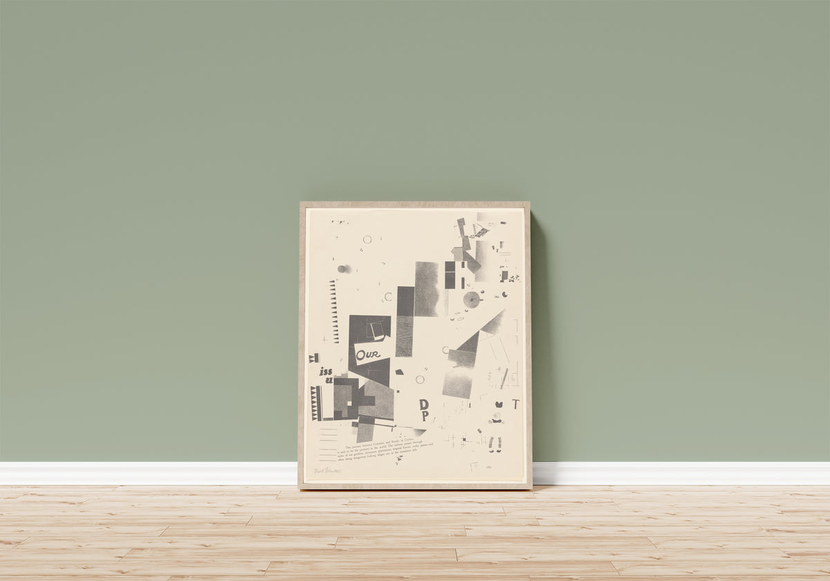 Framed art print of Merz 3. Kurt Schwitters 6 Lithos Pl.7 by Kurt Schwitters, in a light wood frame leaning on a sage green wall above a wooden floor