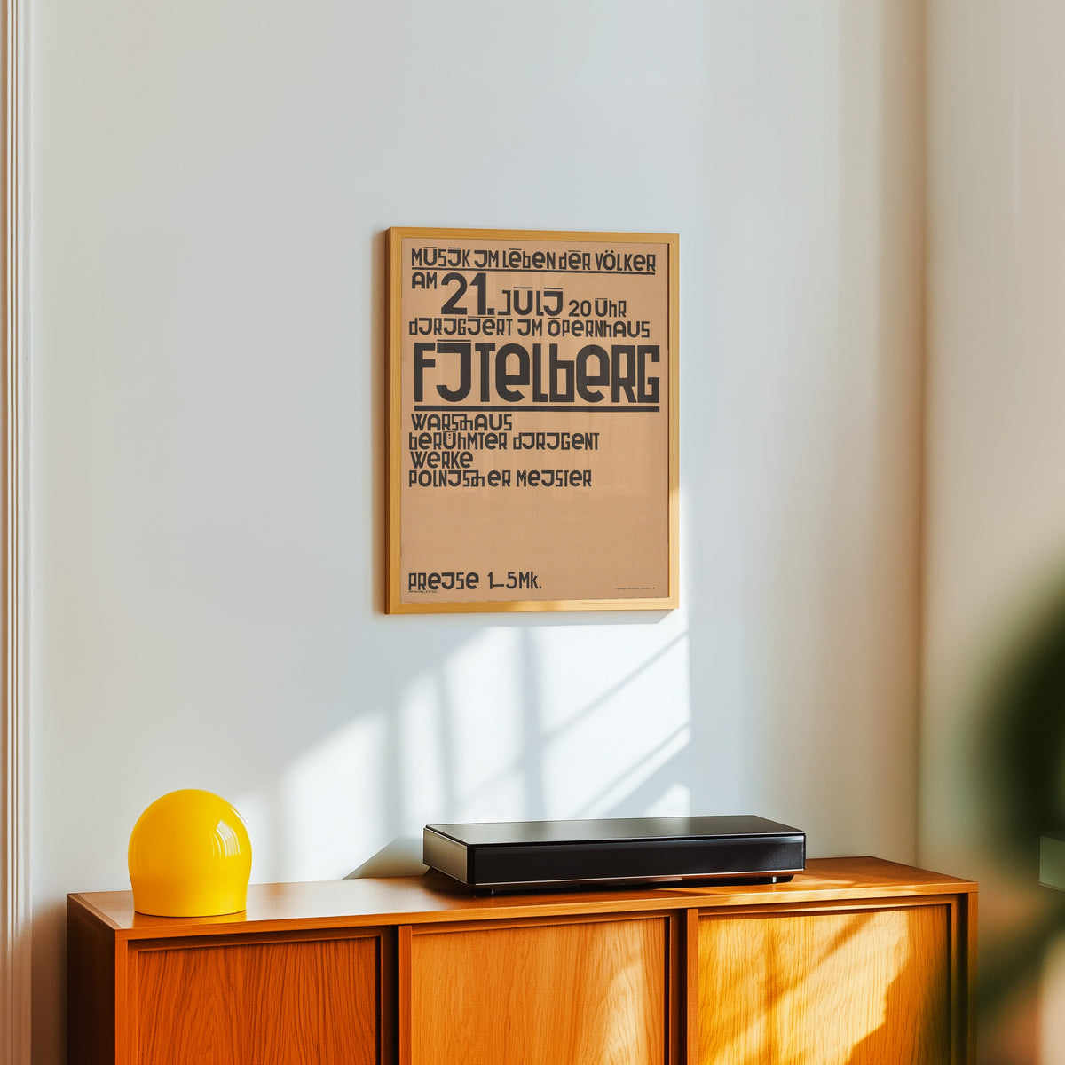 Framed art print of Musik im Leben der Völker, am 21. Juli 20 Uhr… by Kurt Schwitters, in a light wood frame on a white wall above an orange sideboard