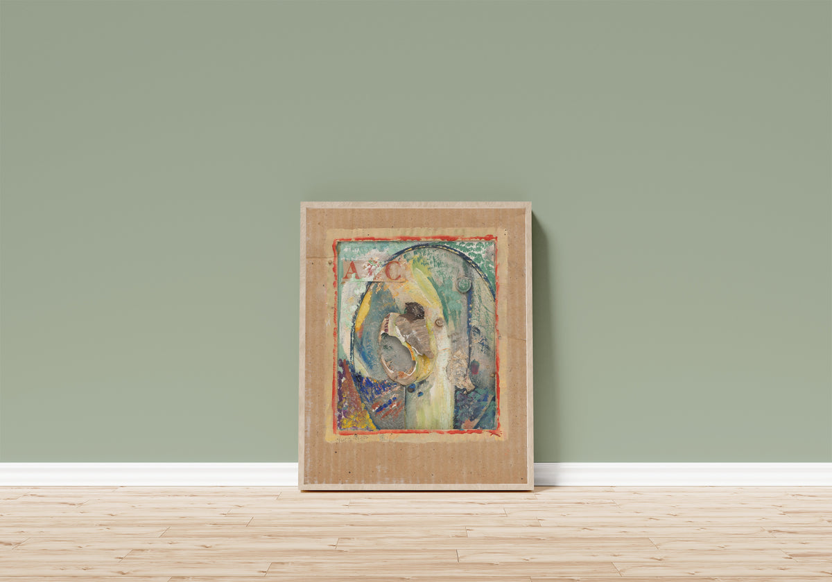 Framed art print of Ohne Titel (ABC) by Kurt Schwitters, in a light wood frame leaning on a sage green wall above a wooden floor
