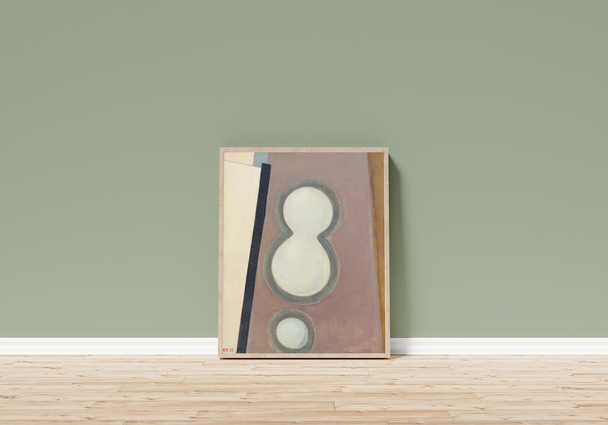 Framed art print of Ohne Titel (Acht) by Kurt Schwitters, in a light wood frame leaning on a sage green wall above a wooden floor