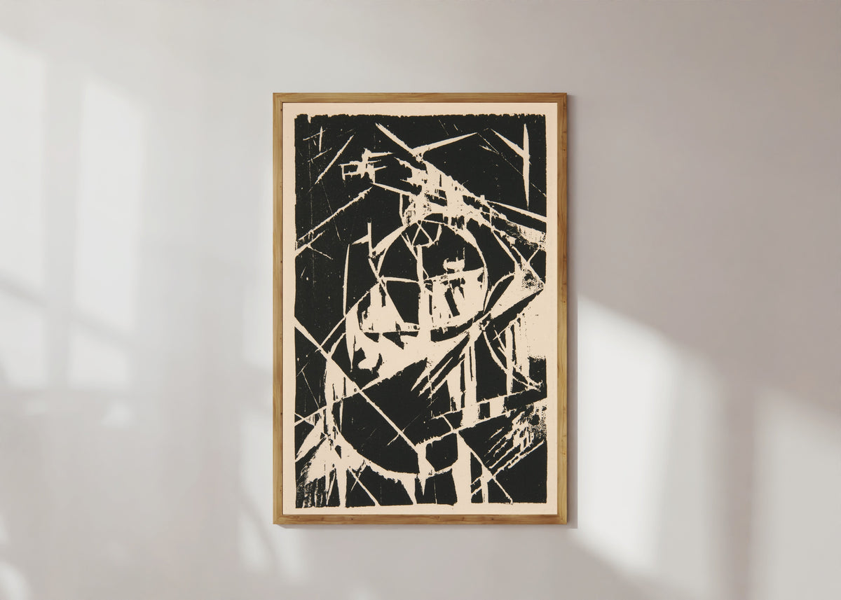 Framed art print of Plate XII from Das Kestnerbuch by Kurt Schwitters, in a light wood frame on a sunlit white wall