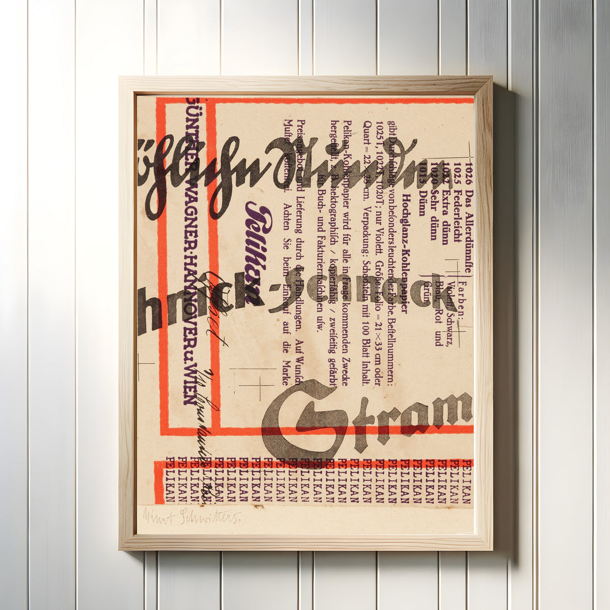 Framed art print of Schnack (Pelikan) by Kurt Schwitters, in a light wood frame on a white panelled wall