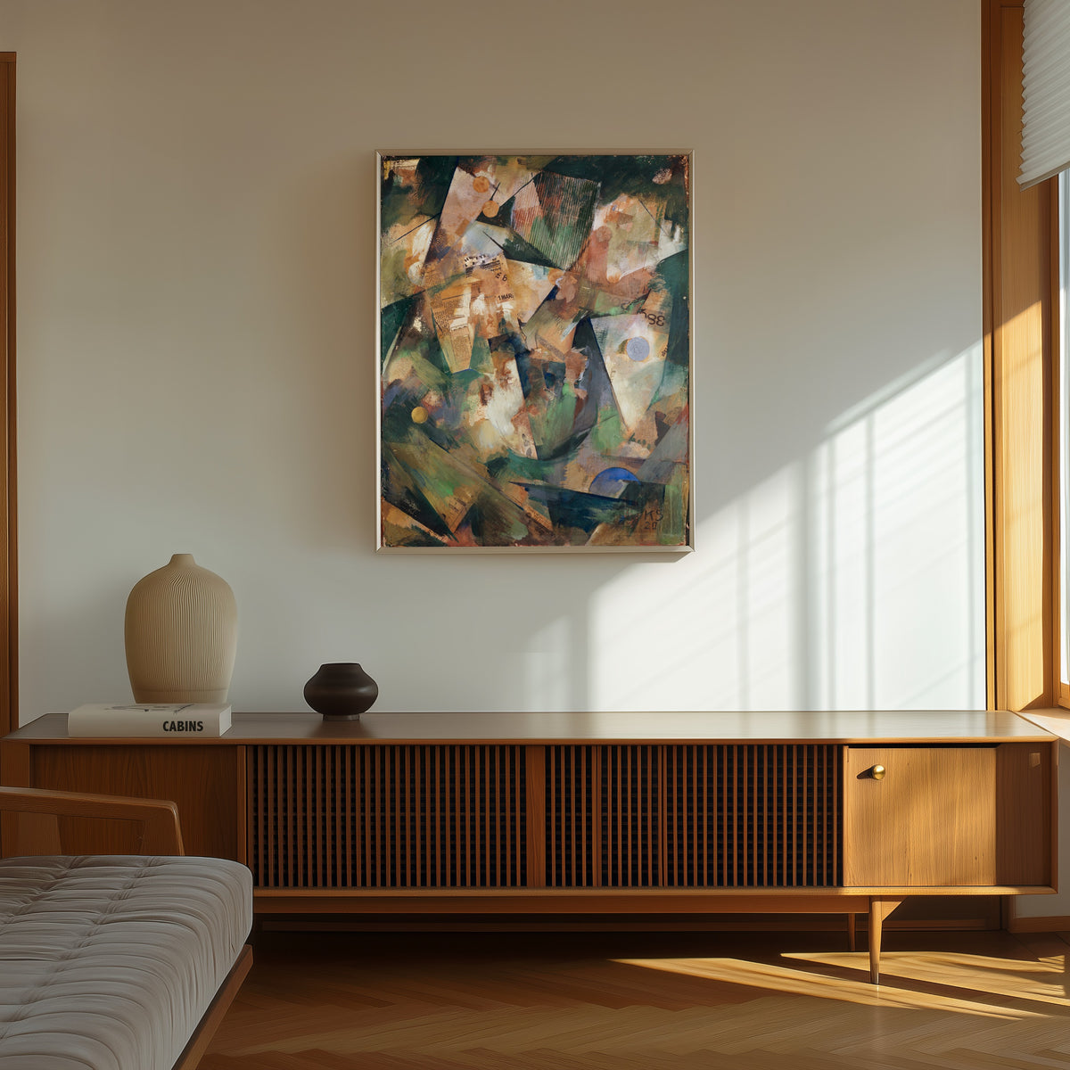 Framed art print of The Springtime Picture Merzpicture 20 B by Kurt Schwitters, in a thin light frame on a sunlit wall above a wooden sideboard
