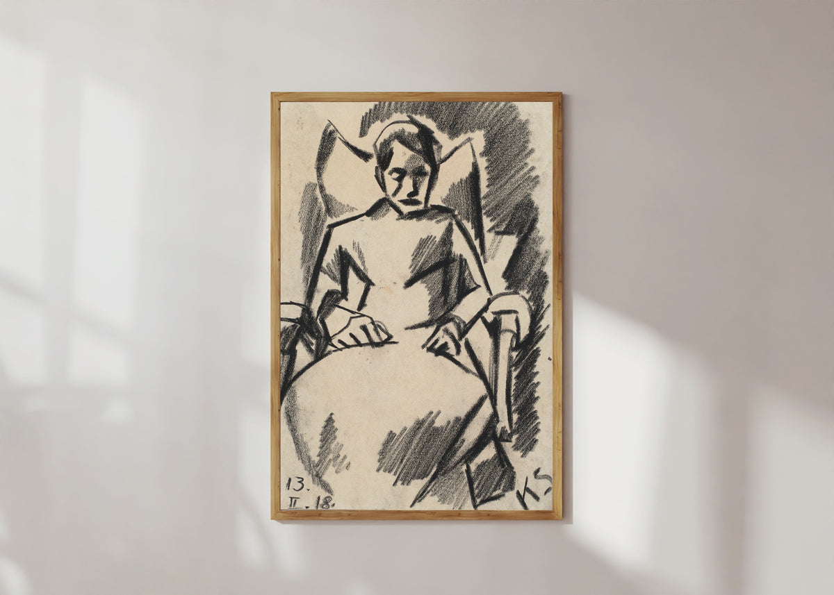 Framed art print of Z 112 Die Kranke by Kurt Schwitters, in a light wood frame on a sunlit white wall