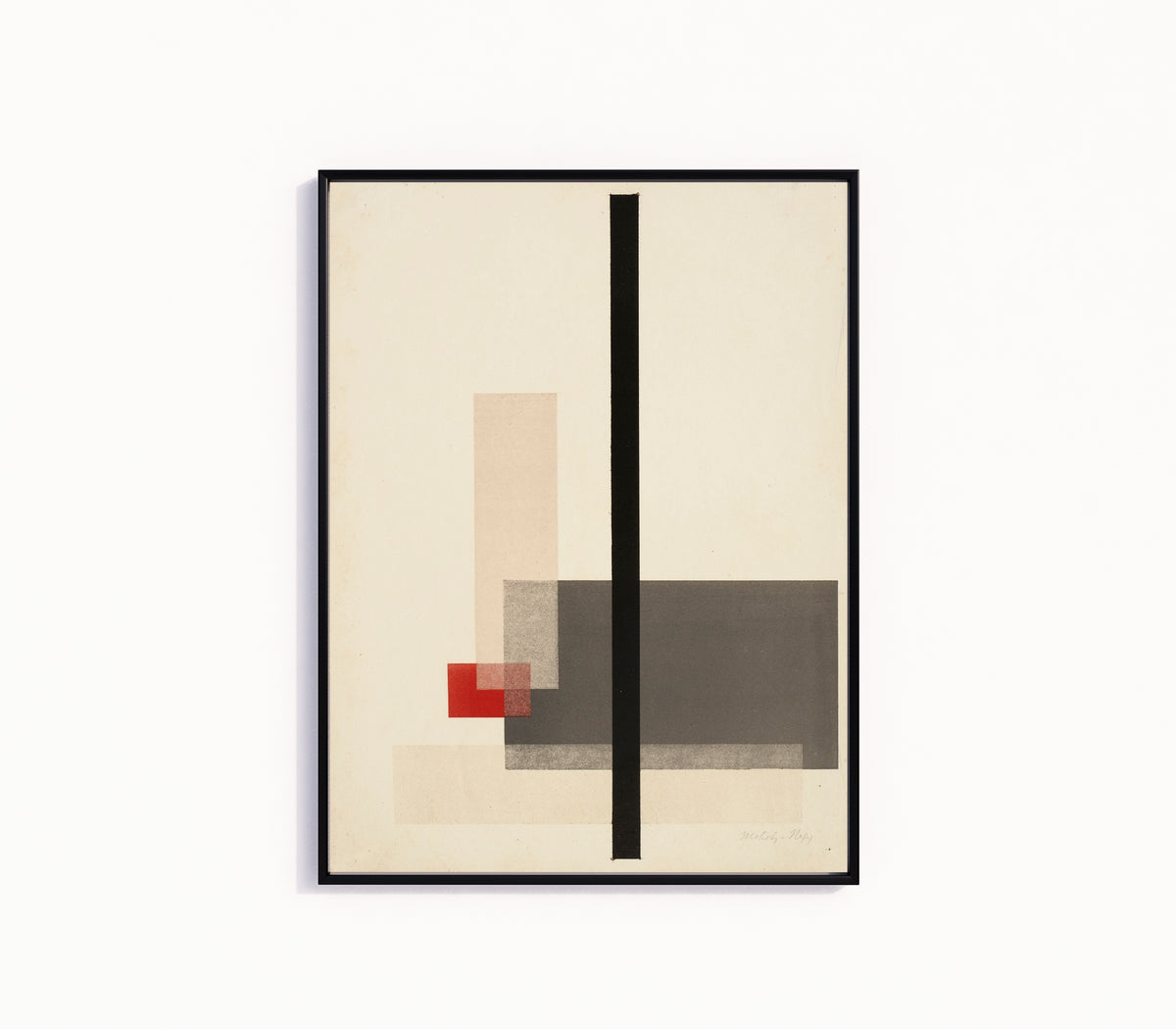 Framed art print of Composition (1923) by László Moholy-Nagy, in a slim black frame on a plain white wall