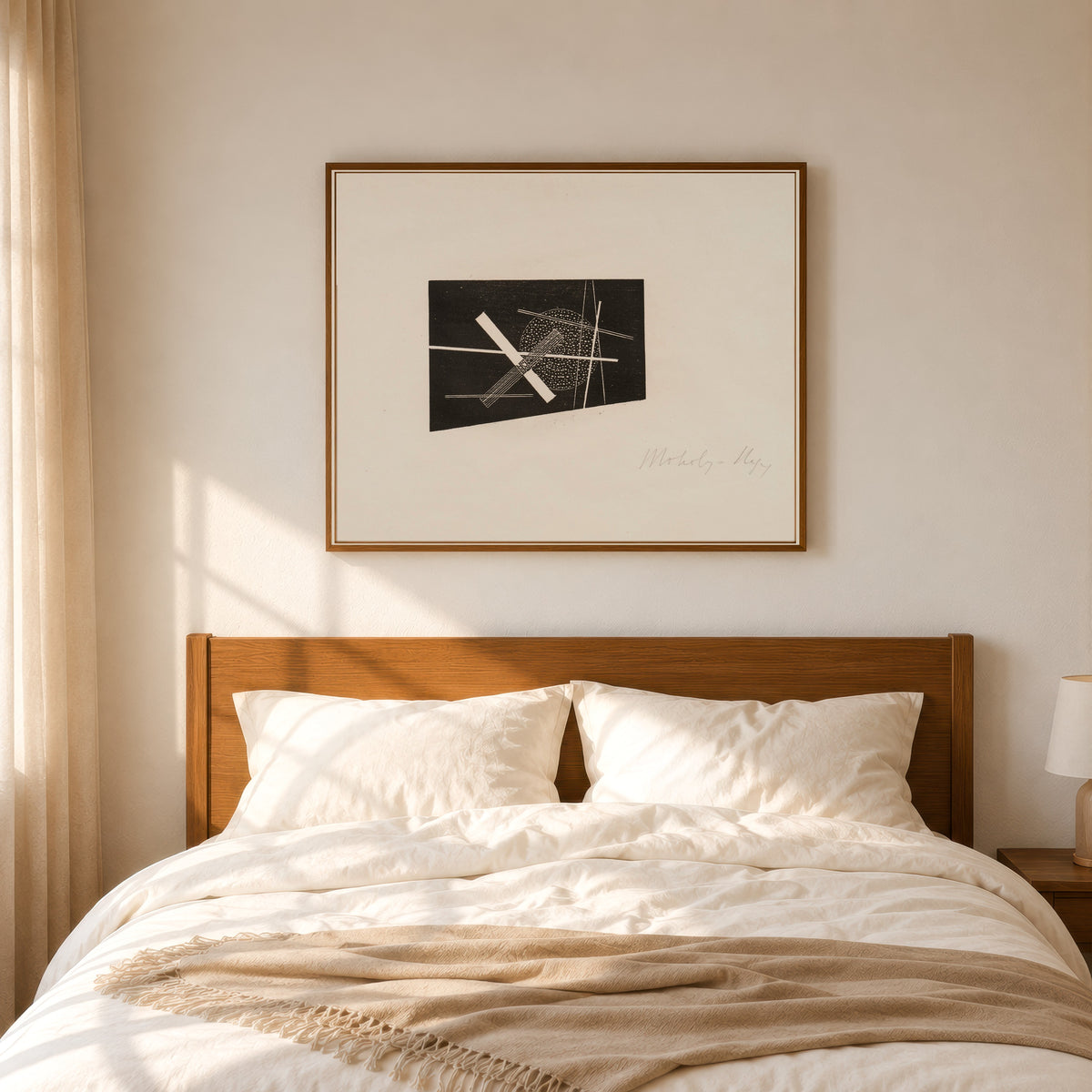 Framed art print of Composition (circa 1923) by László Moholy-Nagy, in a slim wood frame above a bed in a sunlit bedroom