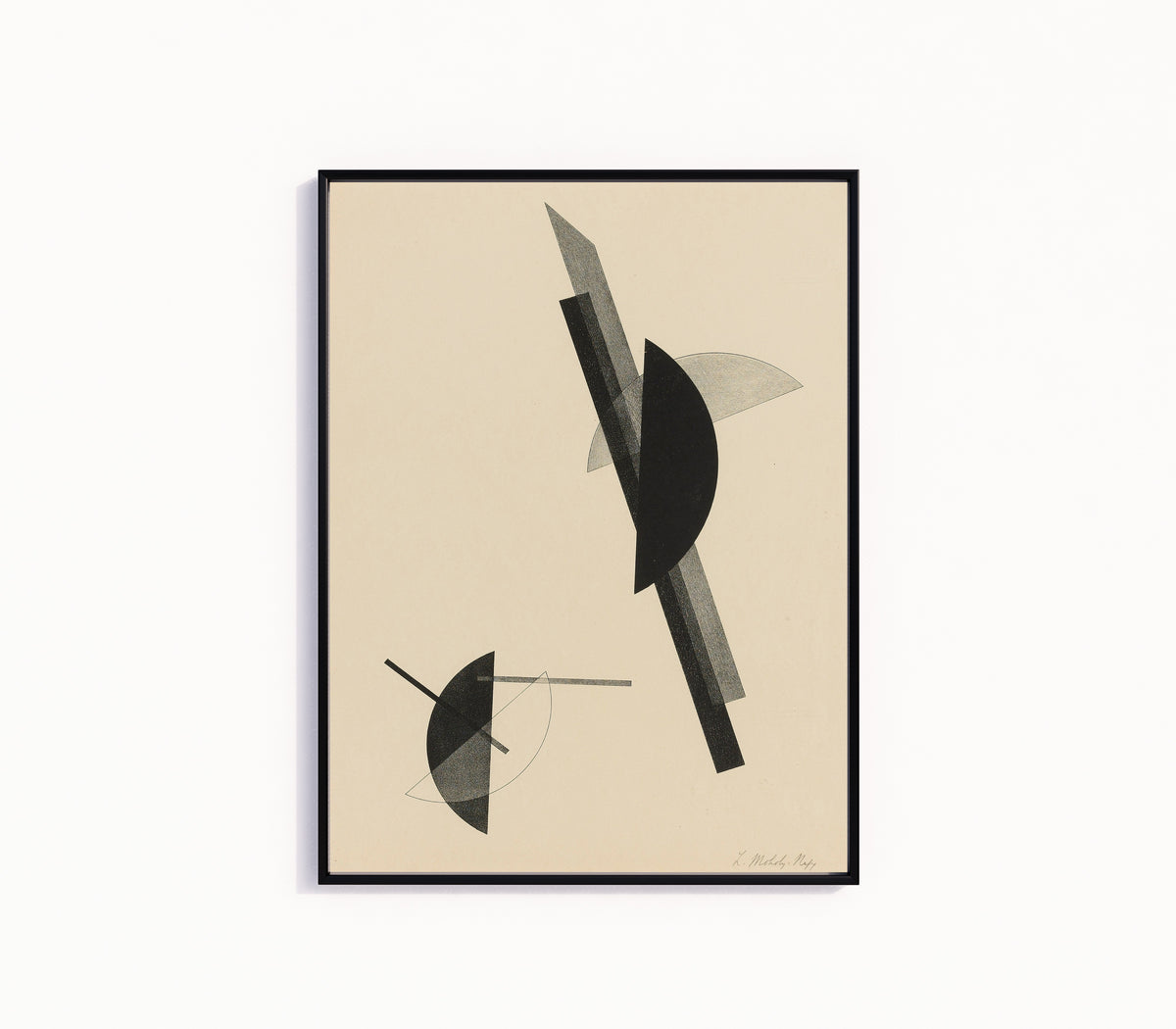 Framed art print of Kestnermappe, Komposition by László Moholy-Nagy, in a slim black frame on a plain white wall