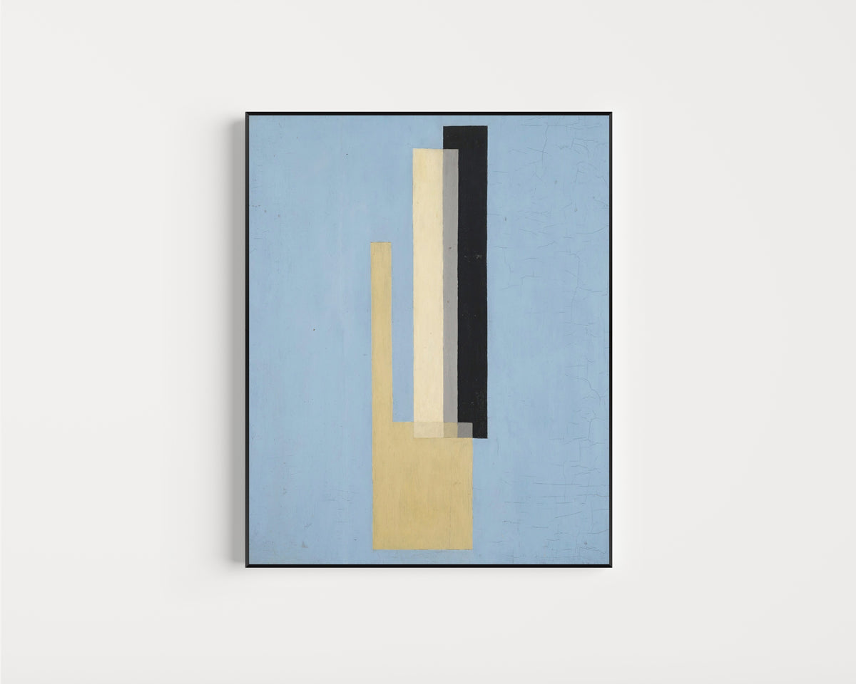 Framed art print of Konstruktion by László Moholy-Nagy, in a slim black frame on a plain white wall
