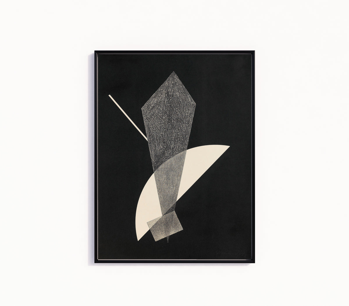 Framed art print of Konstruktion V (1923) by László Moholy-Nagy, in a slim black frame on a plain white wall