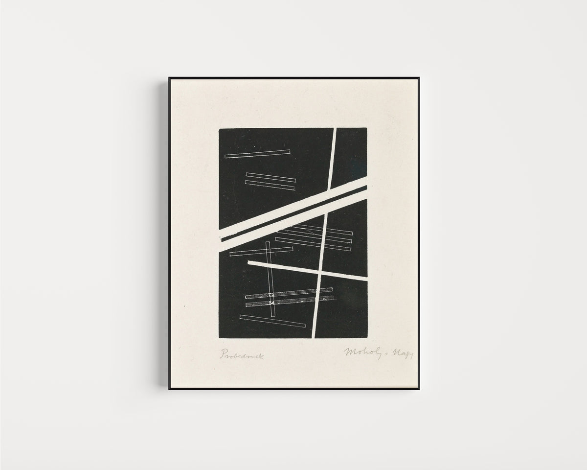 Framed art print of Untitled composition by László Moholy-Nagy, in a slim black frame on a plain white wall