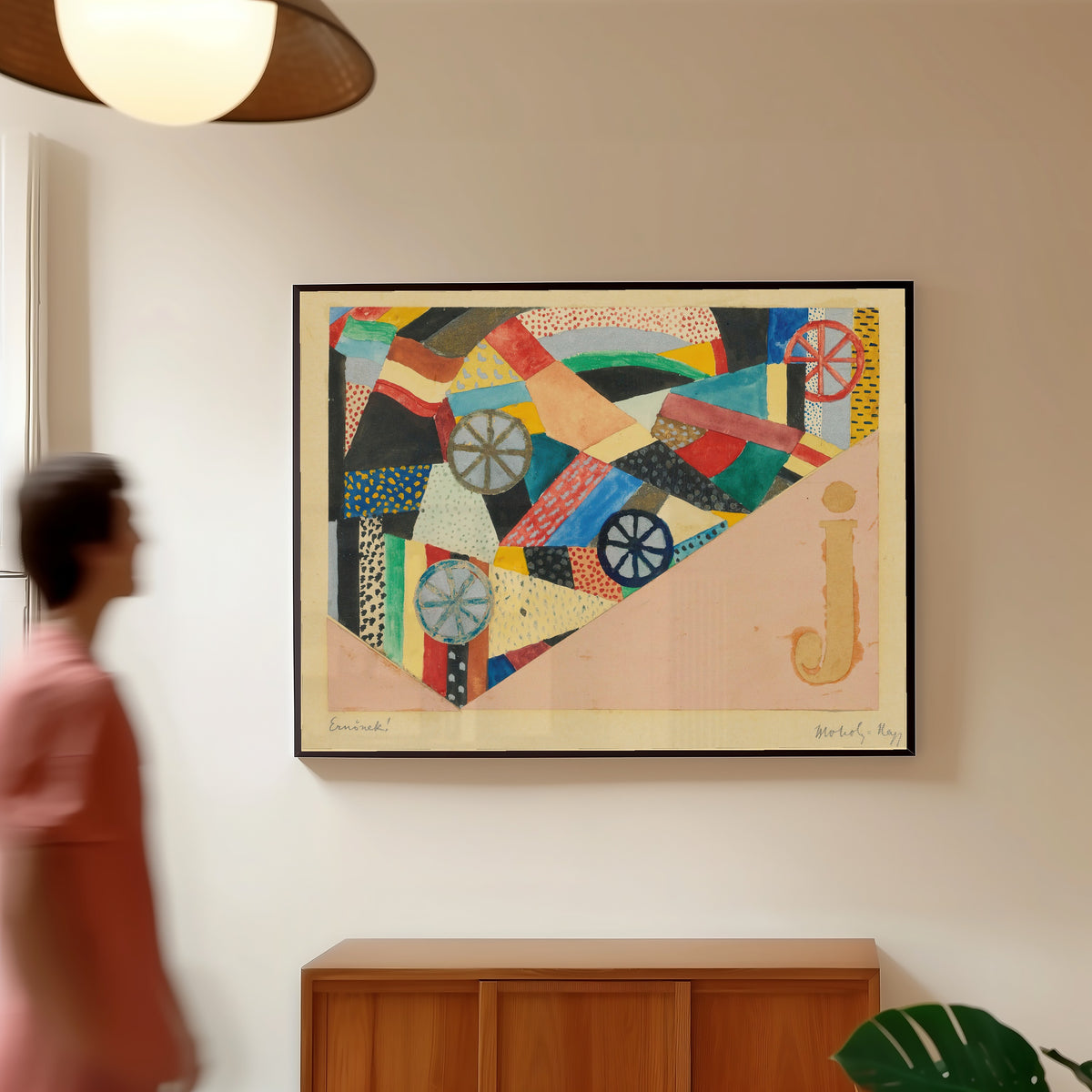 Framed art print of Untitled (J Under Fields, For Ernst Kállai) by László Moholy-Nagy, in a slim black frame on a warm wall in a sunlit room