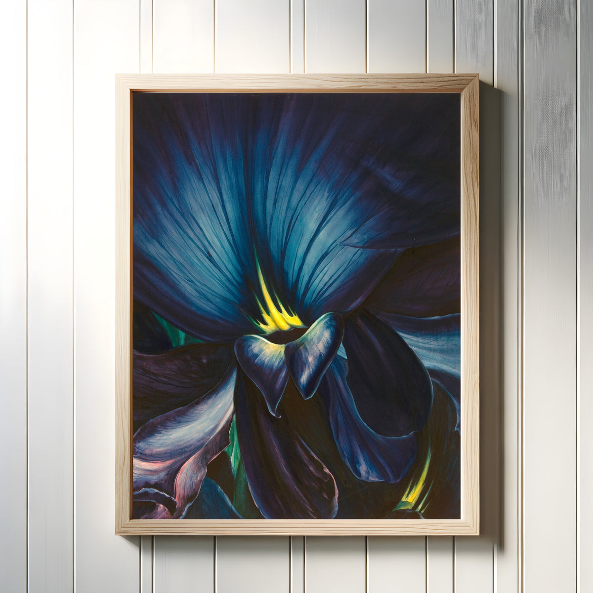 Framed art print of Chinese Delphinium by Leon Carrol, in a light wood frame on a white panelled wall