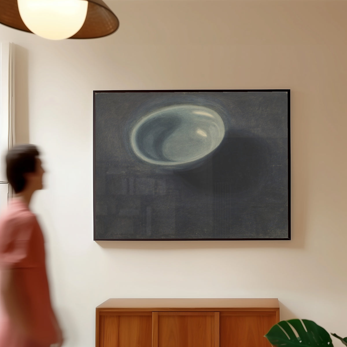 Framed art print of De blauwe teil by Léon Spilliaert, in a slim black frame on a warm wall in a sunlit room