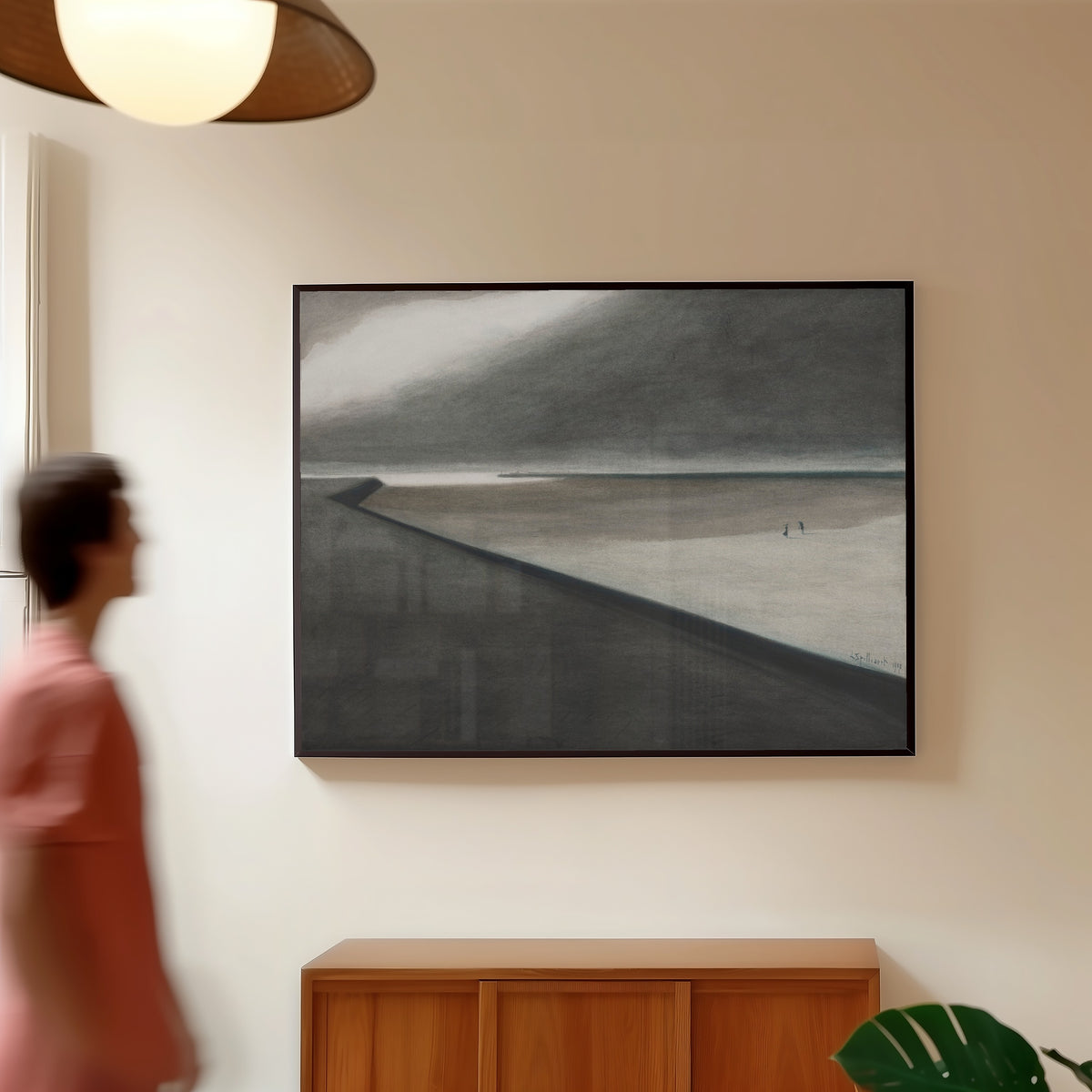Framed art print of Digue et plage by Léon Spilliaert, in a slim black frame on a warm wall in a sunlit room