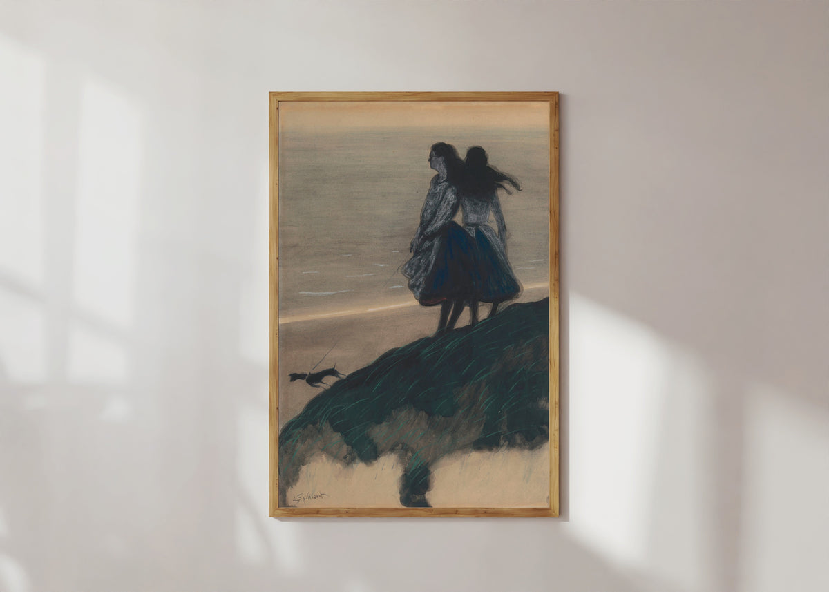 Framed art print of Girls on a Dune by Léon Spilliaert, in a light wood frame on a sunlit white wall