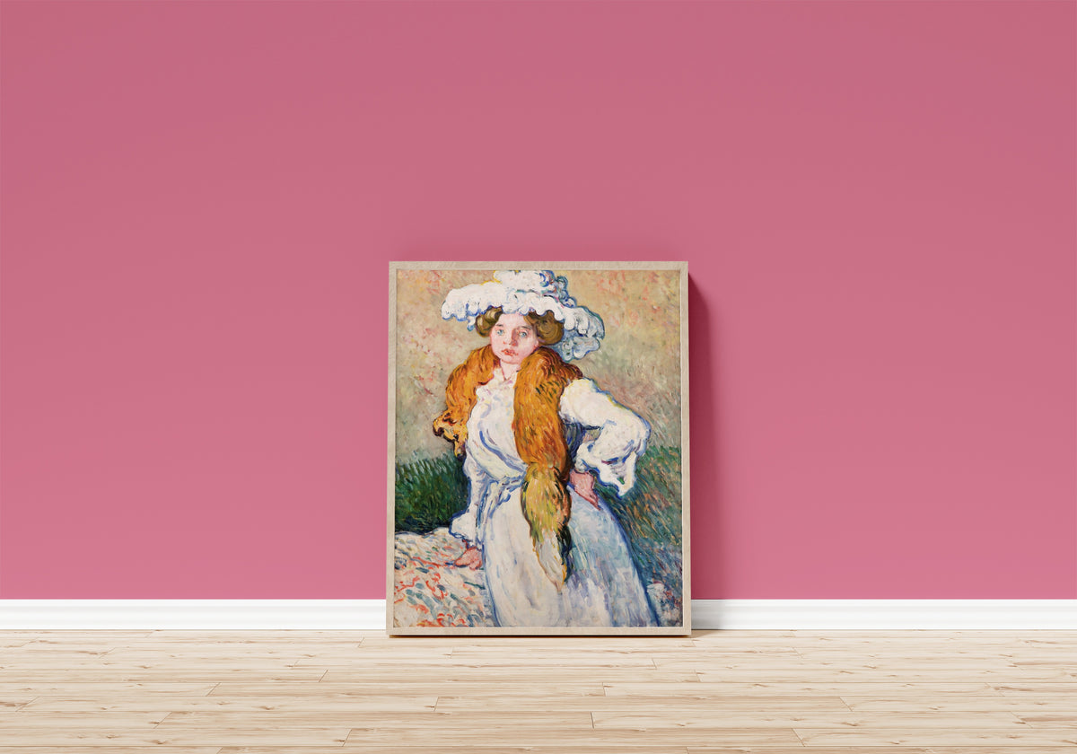 Framed art print of Suzanne Valtat au renard by Louis Valtat, in a light wood frame leaning on a pink wall above a wooden floor