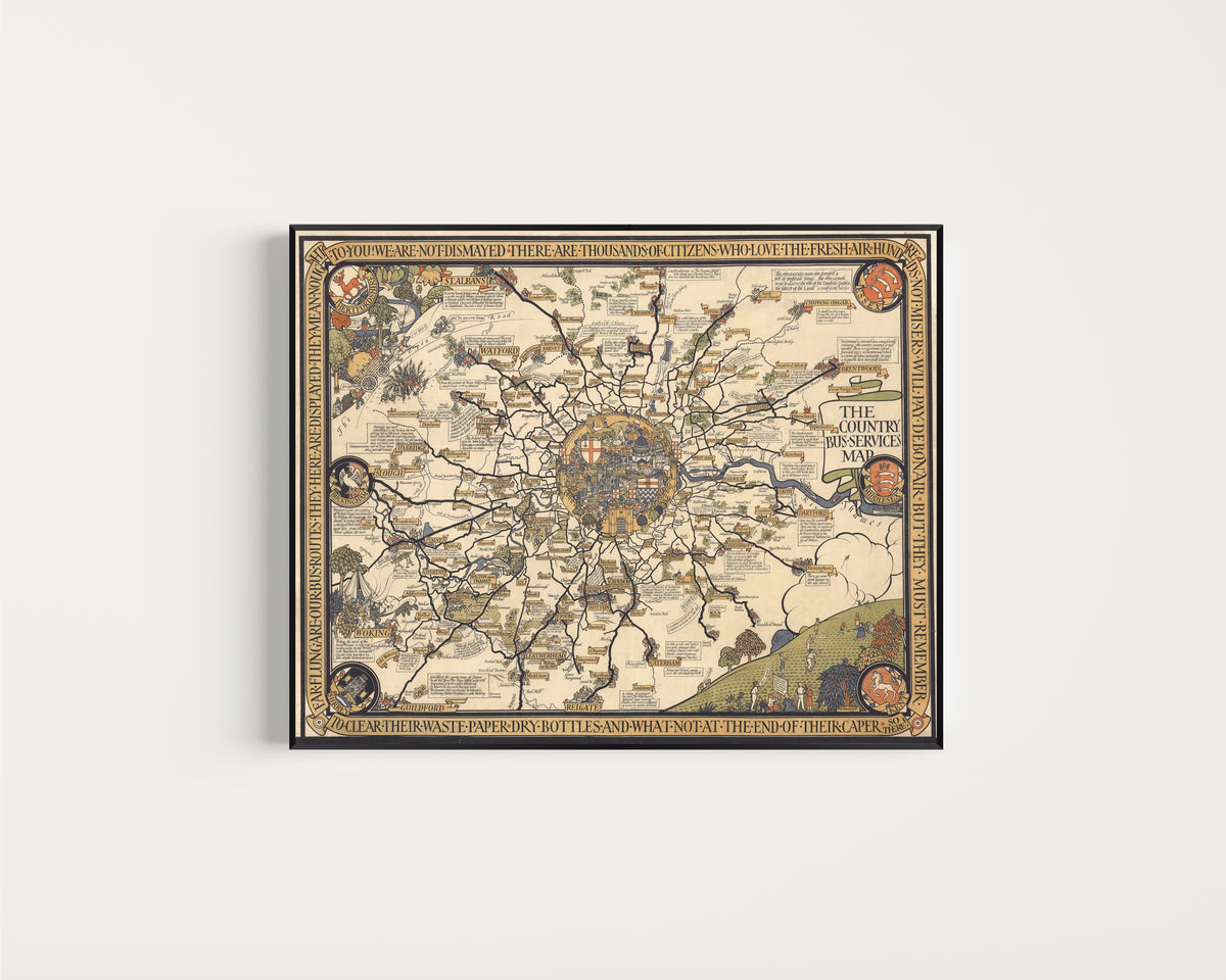 Framed art print of The Country Bus-Services Map, London and Vicinity by MacDonald Gill, in a slim black frame on a plain white wall