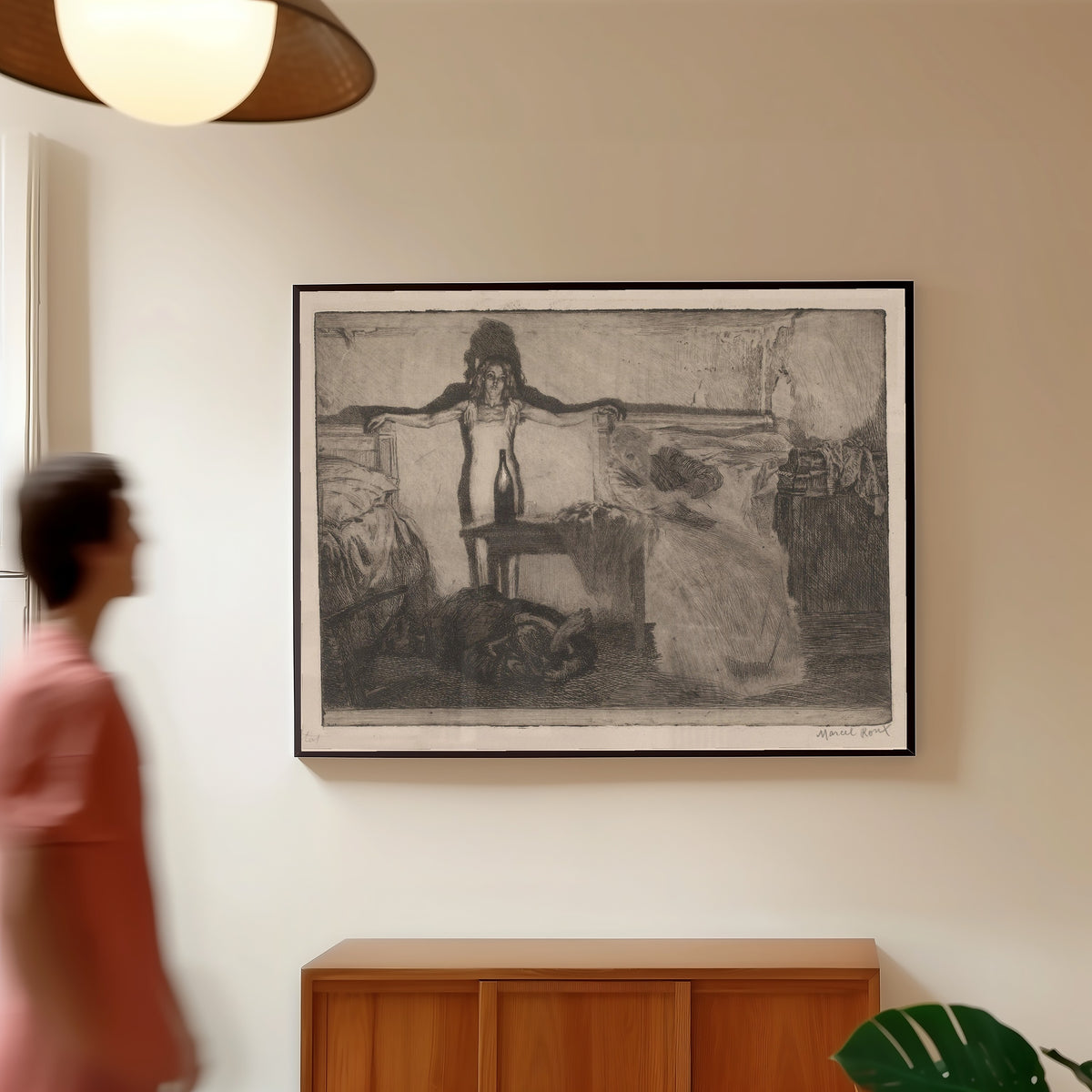 Framed art print of Alcohol by Marcel Roux, in a slim black frame on a warm wall in a sunlit room