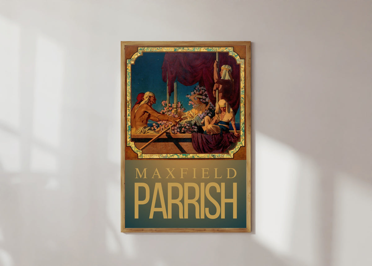 Framed art print of Cleopatra by Maxfield Parrish, in a light wood frame on a sunlit white wall