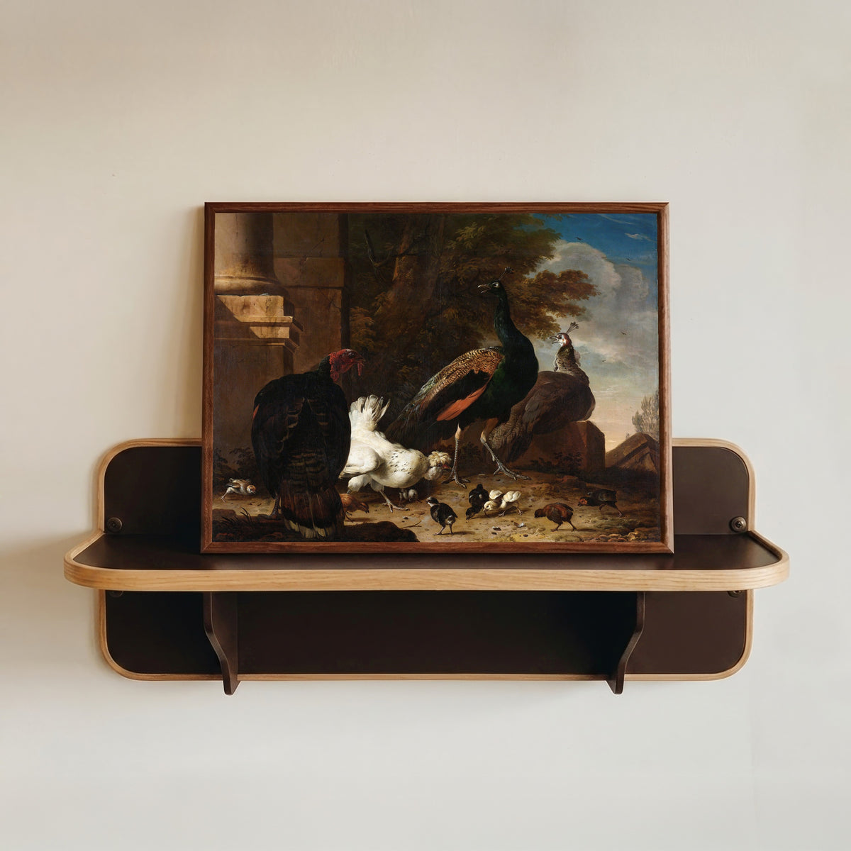Framed art print of Een hen met pauwen en een kalkoen (A Hen with Peacocks and a Turkey) by Melchior d'Hondecoeter, in a dark wood frame resting on a wall shelf