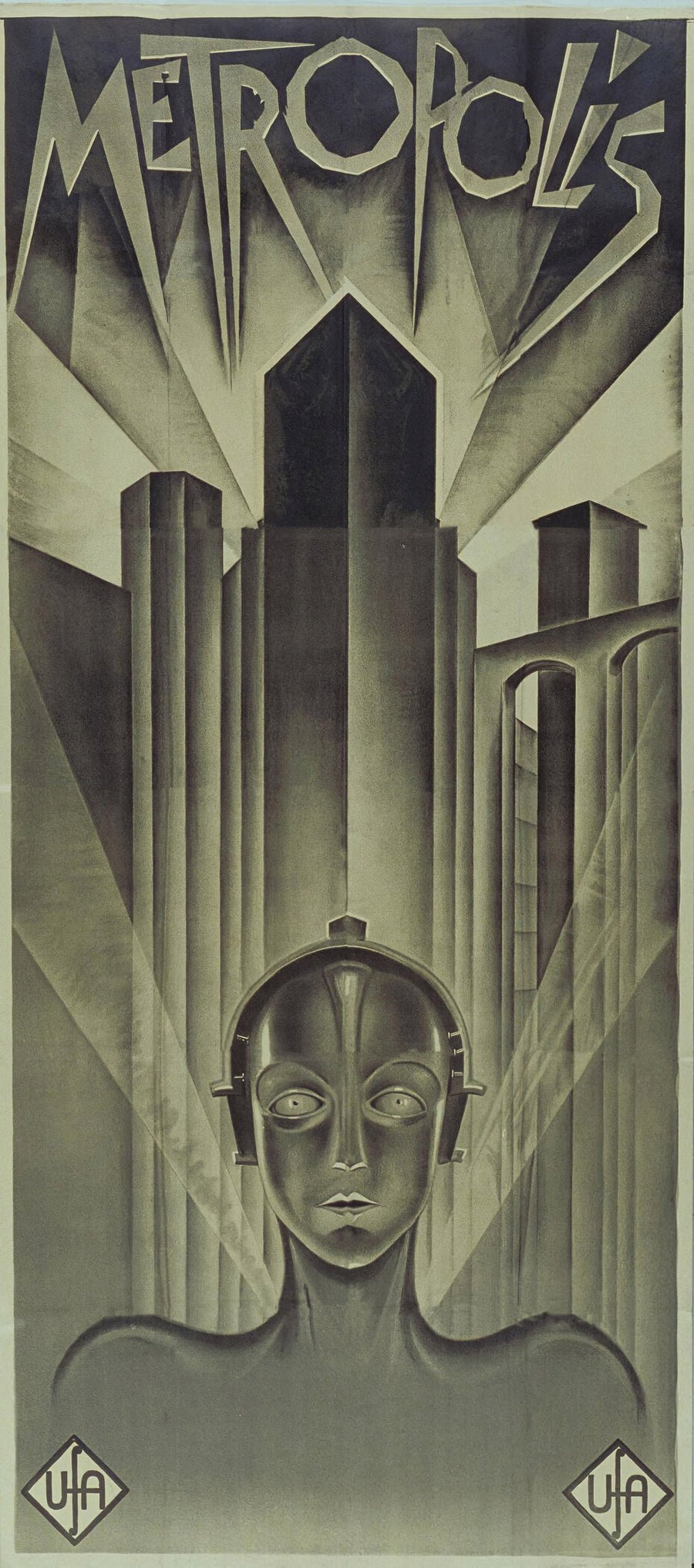 Metropolis — Fritz Lang | Art Deco Movie Poster Fine Art Print (2×1) shown to scale on a wall above a sofa